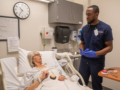 A nursing student in a simulation